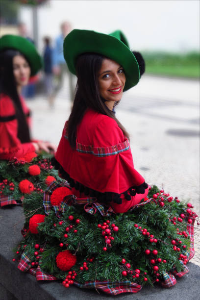 Smiling Christmas girl Funchal, Madeira, Portugal - 12/13/2015. Christmas girl smiling at the camera funchal christmas stock pictures, royalty-free photos & images