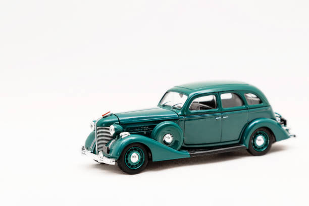 istock Toy small model of a retro car 1332856527
