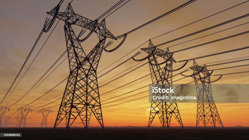 High Voltage Electric Power Lines At Sunset The silhouette of the high voltage power lines during sunset. Power Line Stock Photo