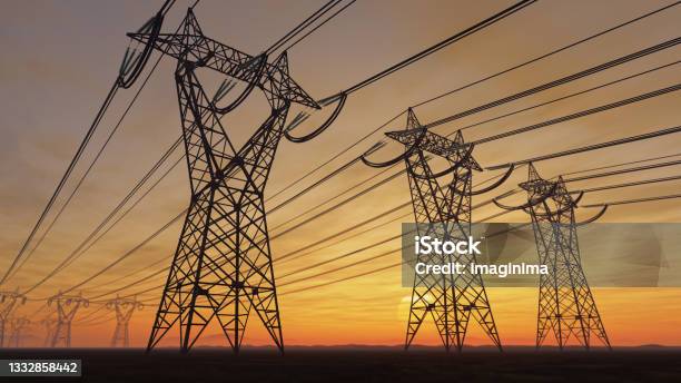 High Voltage Electric Power Lines At Sunset Stock Photo - Download Image Now - Power Line, Fuel and Power Generation, Electricity