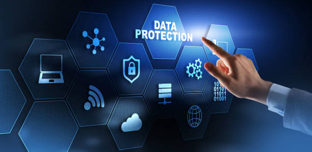 istock Data protection concept. Businessman pointing on virtual screen with text and icons 3D 1332865115