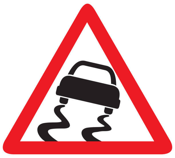 Slippery road sign vector art illustration