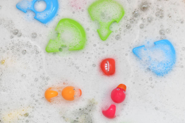 istock Rubber multicolored toys in a bubble bath 1332871842