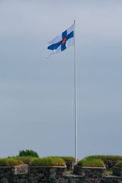 istock Finland Flag with Coat or Arms during Midsummer 1332873673