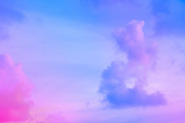 istock beauty abstract sweet pastel soft blue with fluffy clouds on sky. multi color rainbow image. fantasy growing light 1332880003