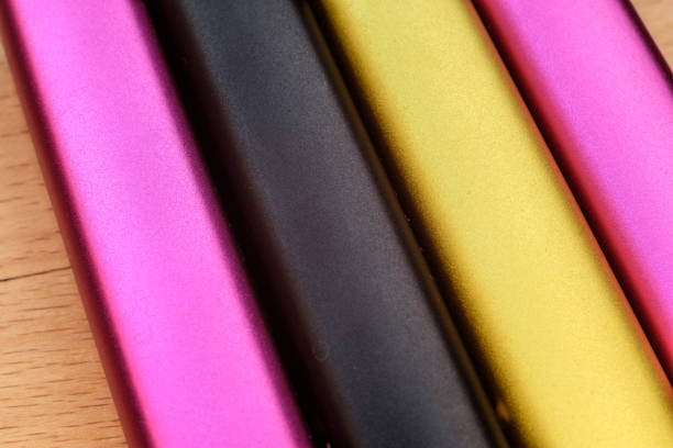 istock multi-colored aluminum rods, parallel to each other, close-up photo 1332884684