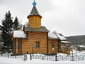 Wooden church in winter in the village