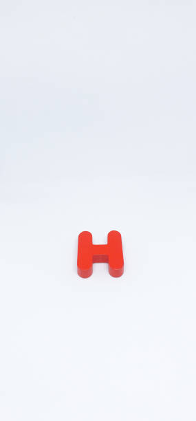 istock letter H on alphabet colored by red lay on white background 1332887497