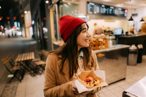 trying out local street food - white denmark nordic countries winter imagens e fotografias de stock