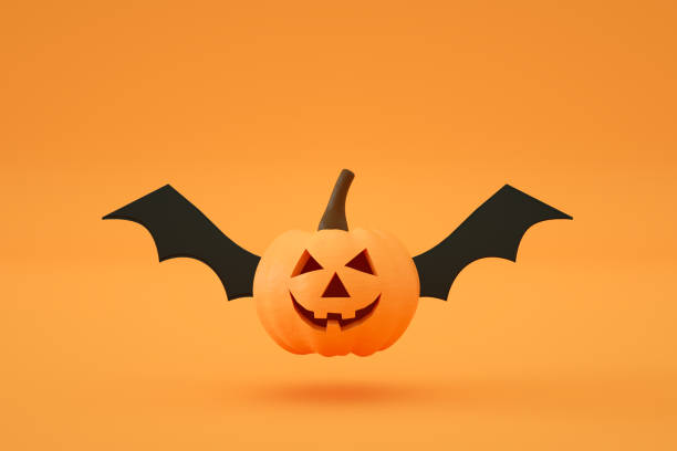 istock Halloween, Pumpkin with Bat Wing, Orange color background. 1332897571