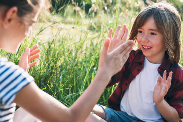 istock A boy and a girl playing outside 1332899238