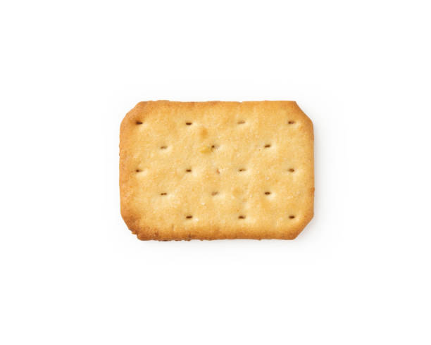 istock Cracker cookies isolated on white background with clipping path 1332900259