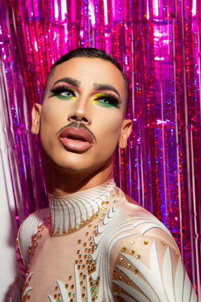 istock young man makeup drag queen performer with colorful background 1332900437