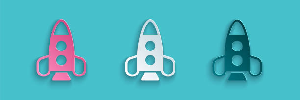 istock Paper cut Rocket ship toy icon isolated on blue background. Space travel. Paper art style. Vector 1332902305