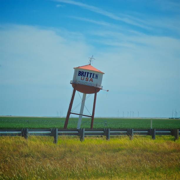 Water tower against a blue sky in New York.