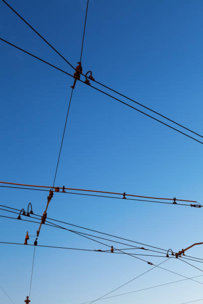 istock Electric traction lines against the blue sky 1332909389