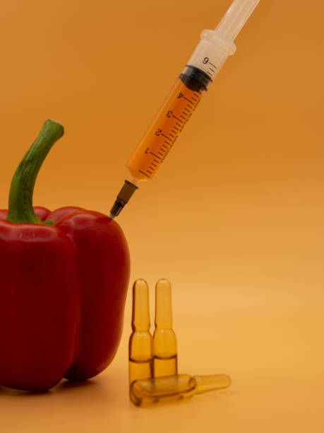 un producto modificado genéticamente. - food crop sprayer insecticide dna fotografías e imágenes de stock