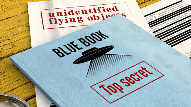 istock Project Blue Book. Ufo. Declassified documents and files, top secret files on a table. 3d rendering 1332917106