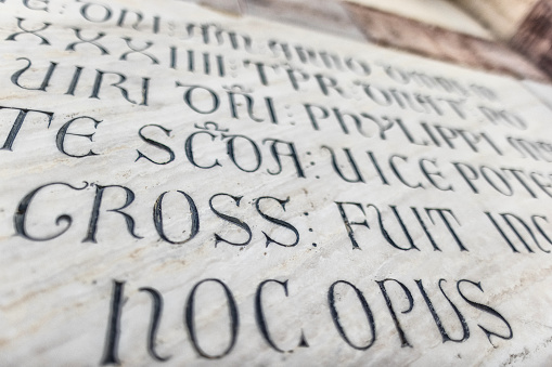 Back to middle age: medieval script on a church in Grosseto