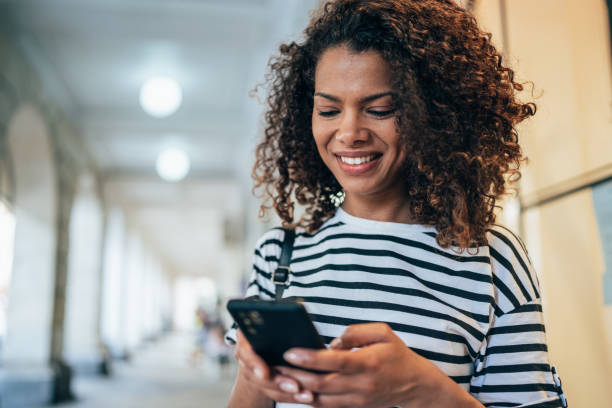 istock Portrait of texting woman 1332928697