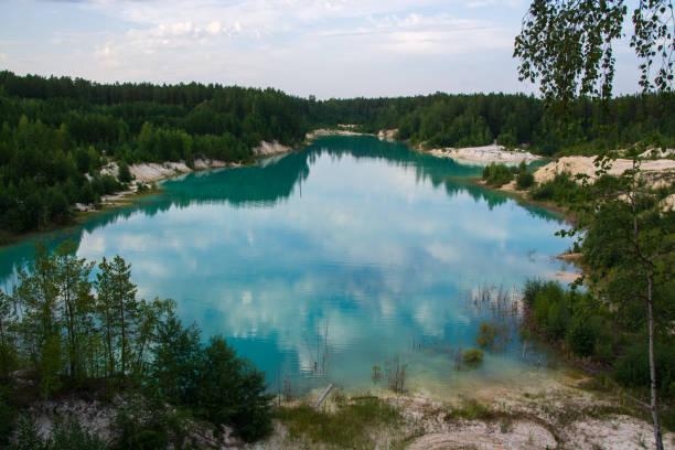 istock kaolin quarry with turquoise water and white clay 1332932433
