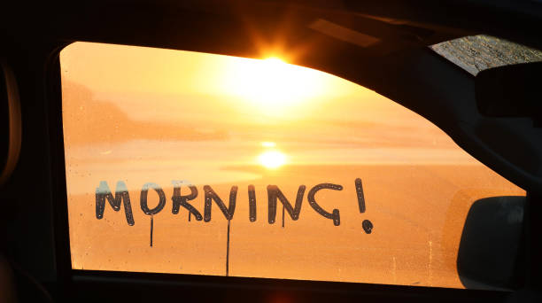 istock Waking up on the coast. Morning through a car window 1332951097