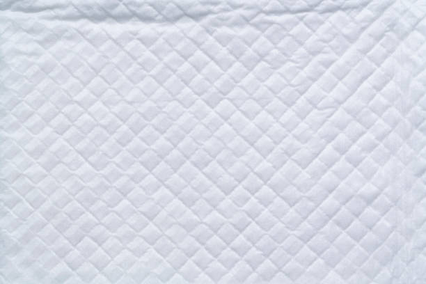 istock closeup white and soft baby cloth crumpled diapers or disposable flat bed sheet with square background and texture 1332951921