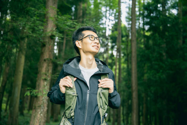 istock Tourist in the forest 1332952839