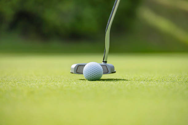 istock A putter shot on the green of a well-maintained golf course 1332961509
