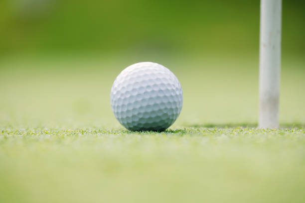 istock A well-maintained golf course green and a pure white golf ball 1332961581