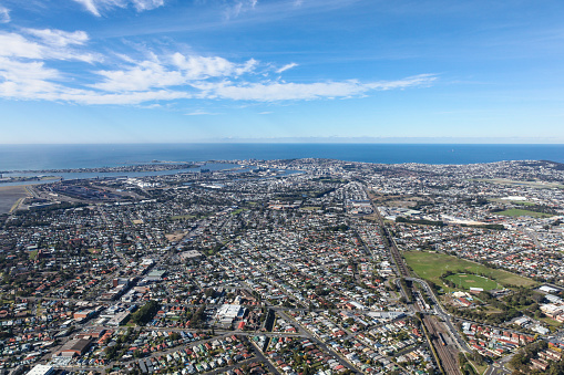 Aerial view of Newcastle showing many of the inner city suburbs through to the harbour and beaches area. Newcastle is a major city in NSW north of Sydney and is experiencing major growth.
