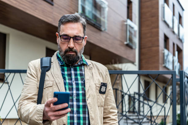 istock Detective collects important information from a mobile phone 1332969436