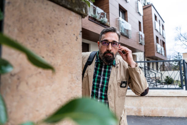 istock Detective collects important information from a mobile phone 1332969447