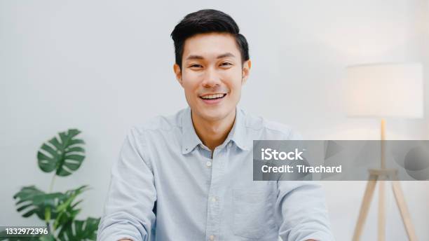 Portrait Of Successful Handsome Executive Businessman Smart Casual Wear Looking At Camera And Smiling Happy In Modern Office Workplace Stock Photo - Download Image Now