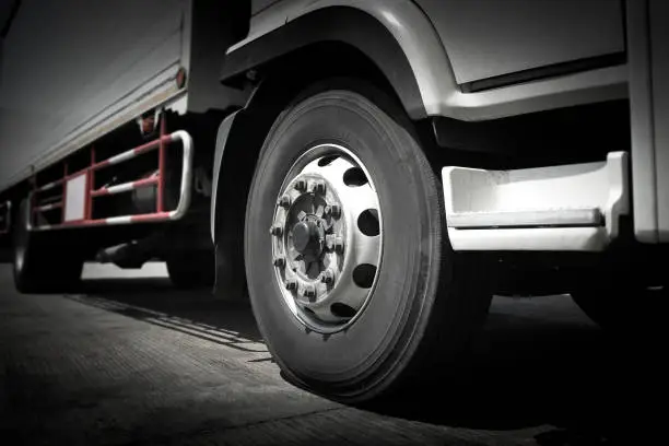 Front of Cargo Truck Wheels. Industry Road Freight Truck. Logistic and CargoTransport Concept.