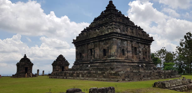 istock Beautiful ancient temple building architecture during sunny day with  blue sky at the background 1332977335