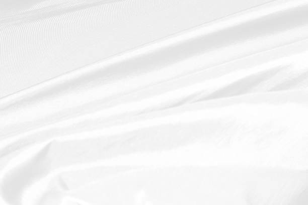 istock abstract drop clean fashion woven beautiful soft fabric smooth curve shape decorative textile white background 1332978457