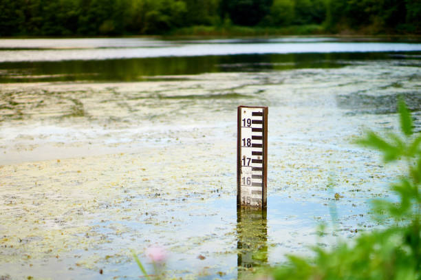 Close up of a water depth marker, with the reading showing a level close to zero.