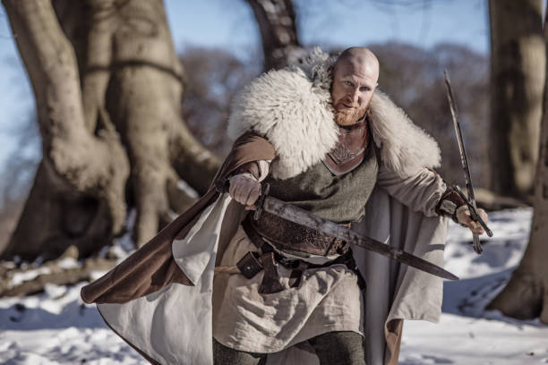 istock Russian viking warrior king in a forest 1332981010