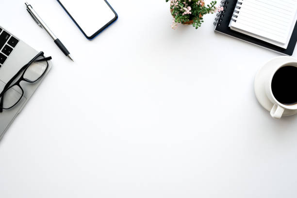 istock Top view of the white workspace at the office. Mock up. 1332985440