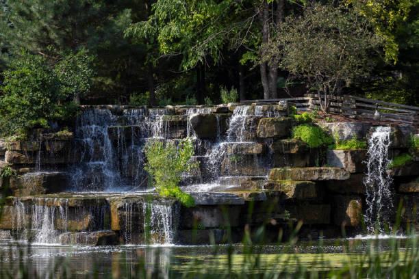 istock The artificial waterfall in the state park 1332987935