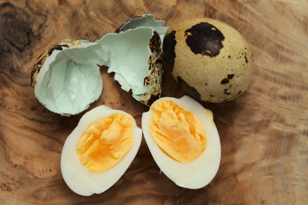 istock small boiled speckled quail eggs peeled and halved 1332988260
