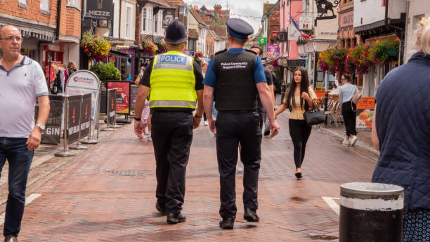 Policeman and Police Community Support Officer Canterbury, Kent, United Kingdom - 7 August, 2021
Policeman and Police Community Support Officer walking down a busy Canterbury street canterbury england photos stock pictures, royalty-free photos & images