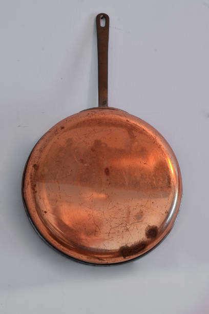 Vintage copper pan stock photo