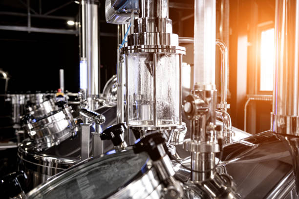 istock Craft beer brewing equipment in privat brewery 1333000330