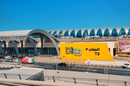 24 February 2021, Dubai, UAE: Entrance to the terminal of modern Dubai DXB Airport. Airline hub concept