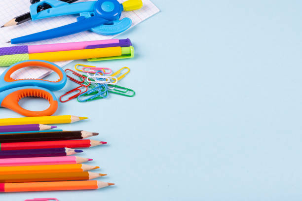 istock School supplies on a color background, table to view, copy space 1333001647