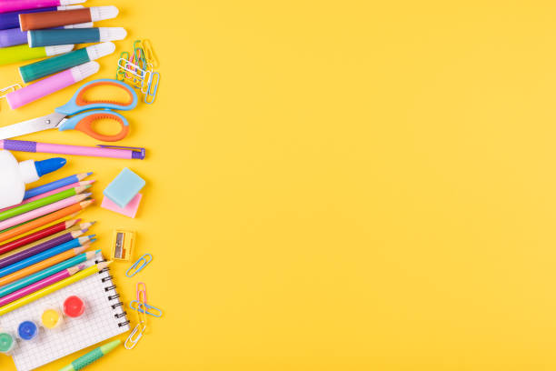 istock School supplies on a color background, table to view, copy space 1333001670