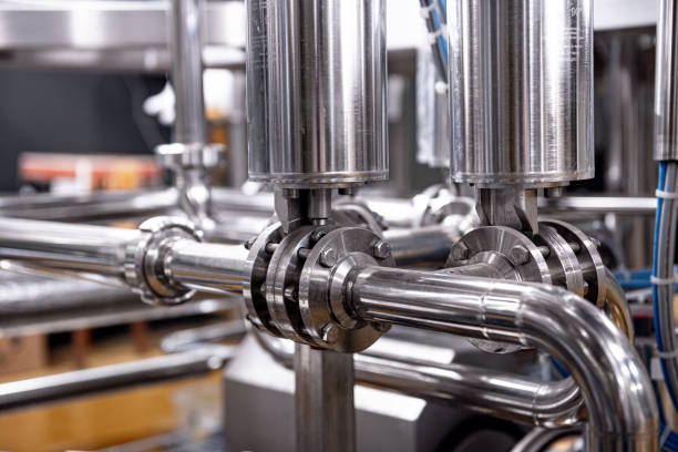 istock Pipes and fittings at a craft modern brewery 1333001728