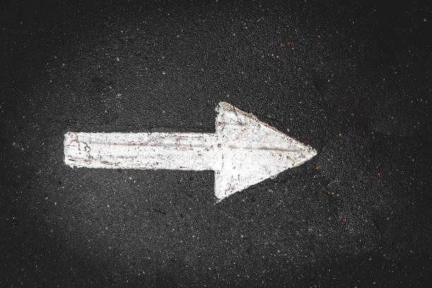 istock direction sign in on the asphalt 1333002798